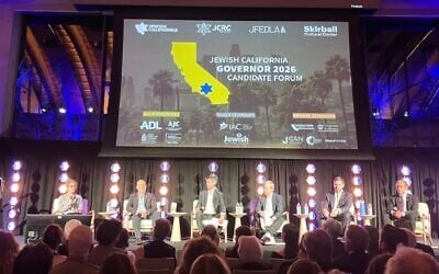 Five California gubernatorial candidates — from left, Steve Hilton, Matt Mahan, Tom Steyer, Eric Swalwell and Antonio Villaraigosa — appear on stage at the Jewish California Governor Candidate Forum at the Skirball Cultural Center in Los Angeles, where antisemitism emerged as a defining issue in the 2026 race. (Asaf Elia-Shalev)